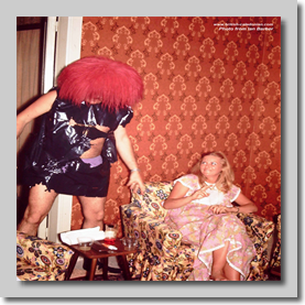 Dave Green menacing young girlie? at room party - Al Attas Hotel annex Jeddah 1973